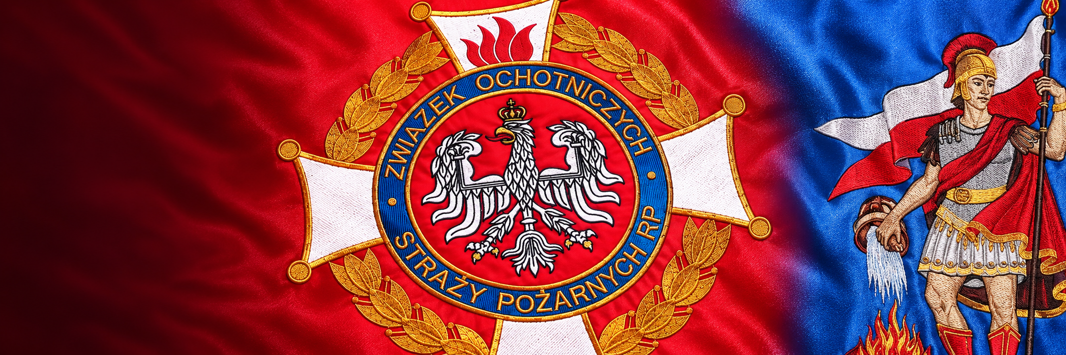 Zbliżenie haftowanego godła ZOSP na czerwonym sztandarze oraz św. Floriana na niebieskim materiale.